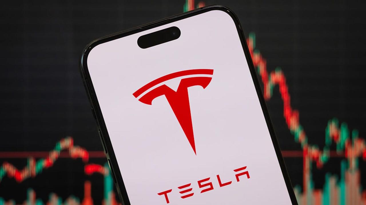 Tesla's Stock Soars as Analyst Predicts 'Golden Age of
