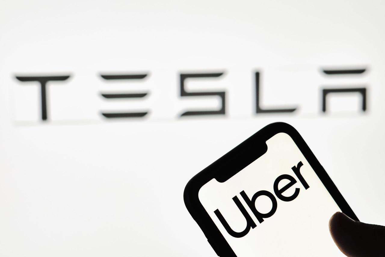 Uber CEO Welcomes Tesla's Robotaxi Entry, Emphasizing
