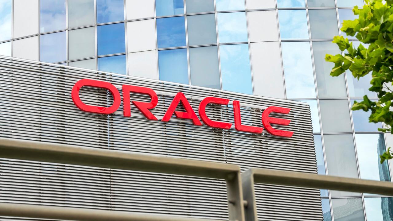 Oracle shares slide 11% as $15B AI spending increase raises